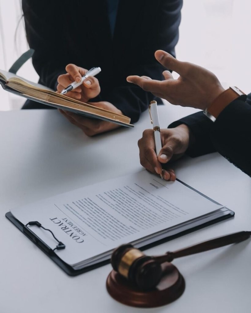 imgi_39_justice-law-concept-legal-counsel-presents-client-signed-contract-with-gavel-legal-law-legal-having-team-meeting-law-firm-background_265022-79532